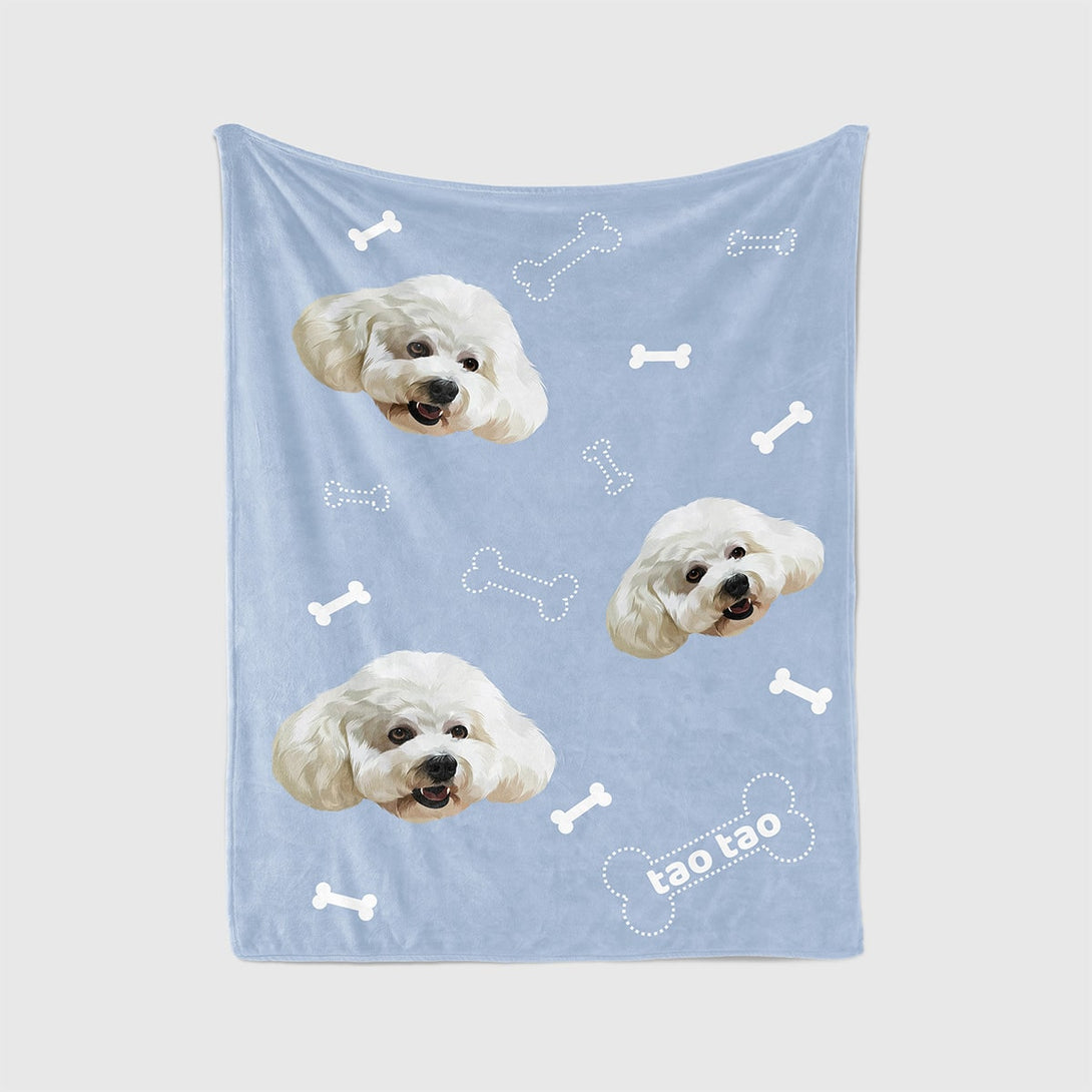 Custom blue blanket featuring portrait of pet and bones, perfect for pet lovers